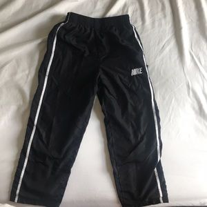 Boys Nike wind pants.